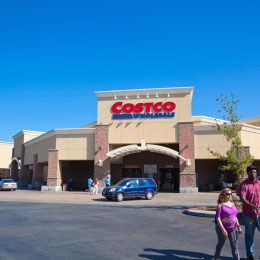 Citrus Heights, California, USA - September 9, 2014: Customers walking in and out of Costco Wholesale store in Citrus Heights, California on a sunny afternoon . Costco is known for discounted prices on its merchandise. Costco Wholesale operates an international chain of membership warehouses, carrying brand name merchandise at substantially lower prices.