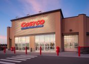 A Costco storefront at dusk