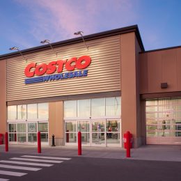 A Costco storefront at dusk