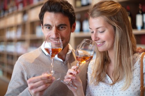 couple on a date enjoying a wine tasting