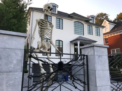 A giant skeleton is among the over-the-top Halloween decorations in front of this house in Bay Ridge, Brooklyn, New York.
