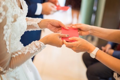 giving bride card at wedding