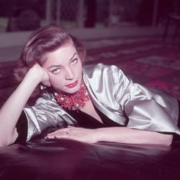 Lauren Bacall posing for a portrait in 1955