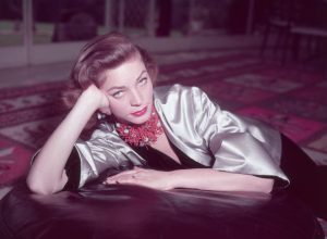 Lauren Bacall posing for a portrait in 1955
