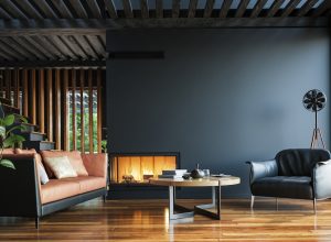 Modern living room with dark walls, beamed ceilings, and a contemporary fireplace
