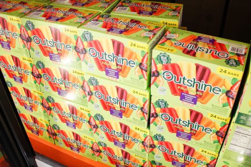 Los Angeles, California, United States - 04-06-2021: A view of several cases of Outshine fruit bars, on display at a local big box grocery store.