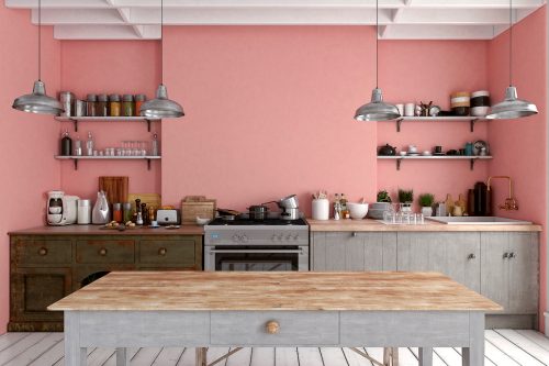 Kitchen with pink walls and gray cabinets