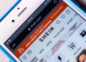A close up of a phone screen visiting the SHEIN website