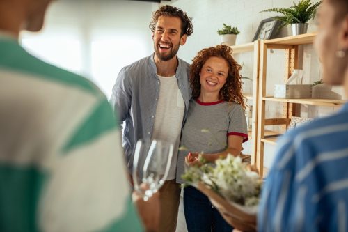 Couples celebrating moving in new apartment