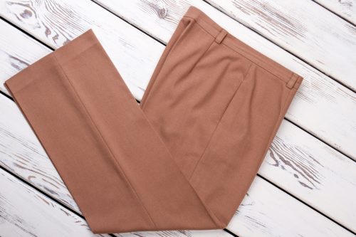 folded brown trousers