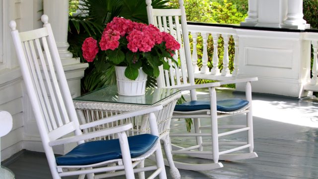 Beautiful porch with rocking chairs and flowers