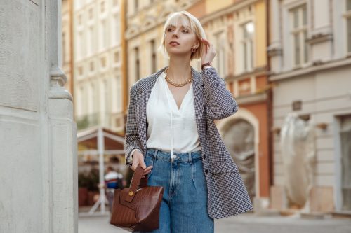woman wearing blazer with jeans