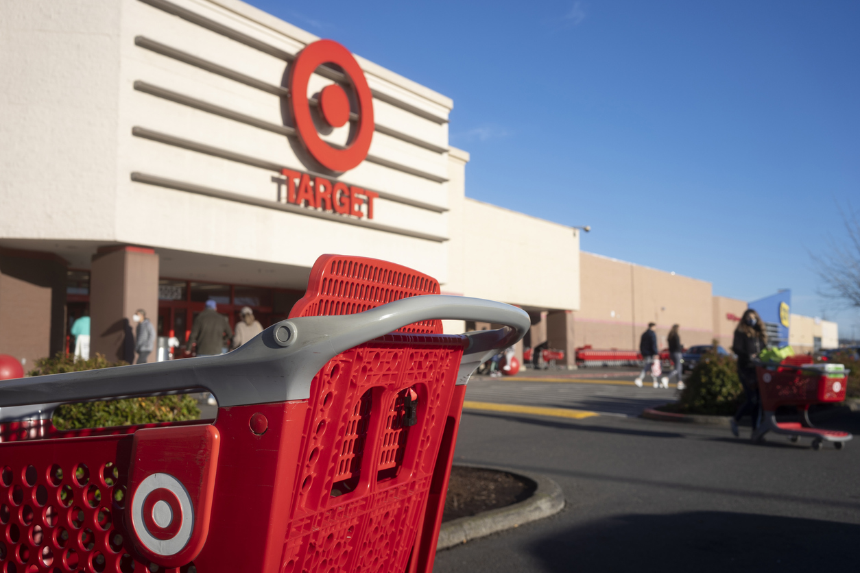 A shopping cart in front of a Target storefront