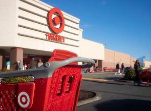 A shopping cart in front of a Target storefront