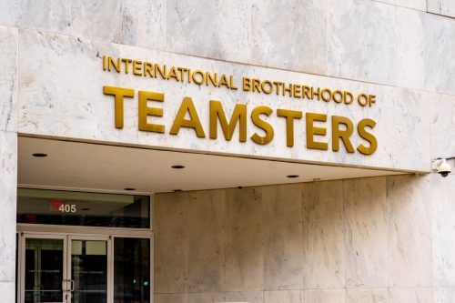 Washington, DC, USA- January 13, 2020: Sign of International Brotherhood of Teamsters at the entrance of its office in Washington, DC. IBT is a labor union in the United States and Canada.
