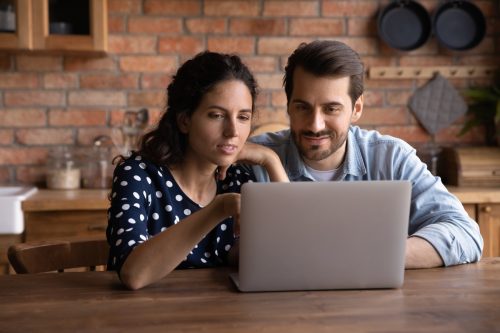 Secure Couple Using Laptop