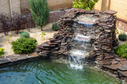 Small Waterfall and Pond in Backyard