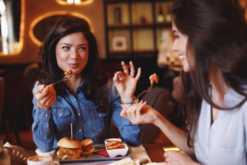 Two Women Enjoying a Meal