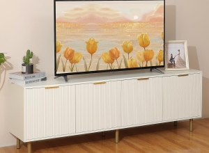 Styled product shot of a white mid-century-modern TV stand from Amazon