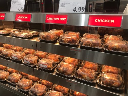 Los Angeles, CA/USA 11/25/2019 Kirkland brand seasoned rotisserie chickens for sale at a Costco Mega Discount Store