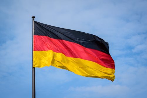 german flag against a clear blue sky