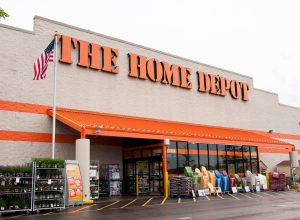 A home depot storefront with chairs and other items for sale