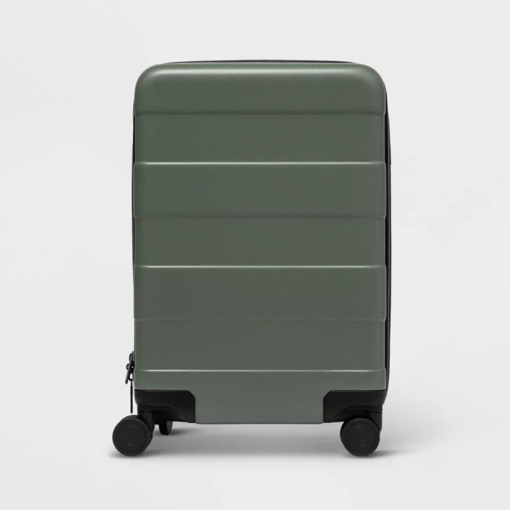 A Made By Design Hardside Carry-On Spinner Suitcase in hunter green