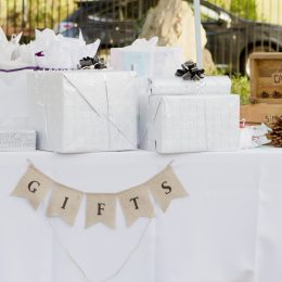 A wedding gift table for an outdoor wedding