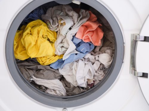 Laundry inside a washing machine. Close up.