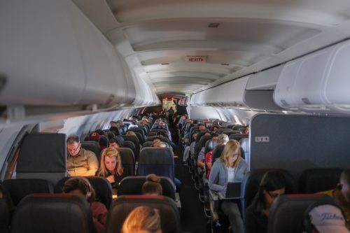 Passengers aboard an American Airlines flight from Washington, DC to Phoenix, AZ, September 9, 2018.