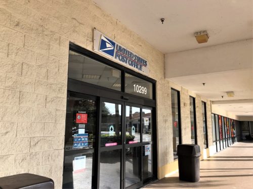 A United States Post Office facility in West Palm Beach, FL, USA. The facility is part of a strip mall. It handles mail, sells postage and packaging supplies and has a section of mail box lockers that can be leased by individuals or businesses.