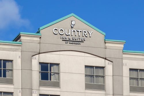 country inn and suites by radisson logo on hotel