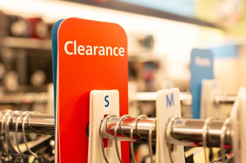 clearance sign at clothing store