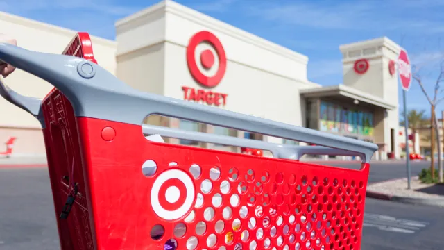 A Target shopping cart in front of a storefront