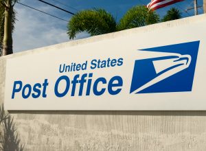 Layton, Florida, United States - August 14, 2018: View of the United States Post Office sign by the Overseas Highway in Layton, Florida Keys - United States