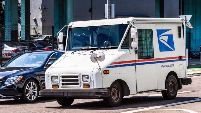 USPS vehicle making deliveries