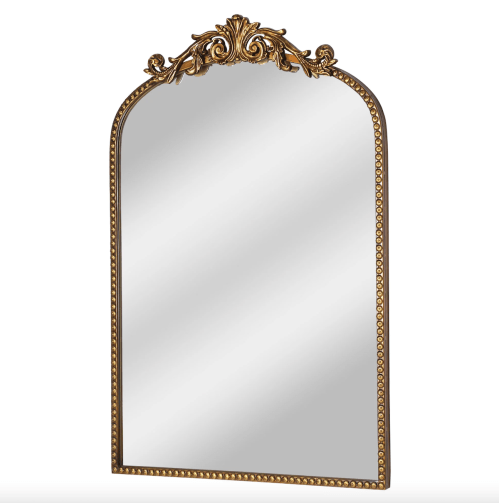 Product shot of a gold mirror from Walmart