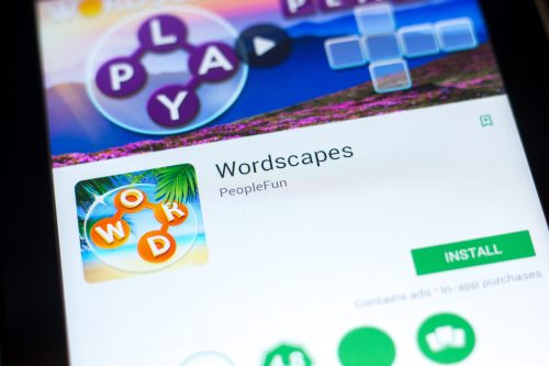 Wordscapes mobile app on the display of tablet PC.