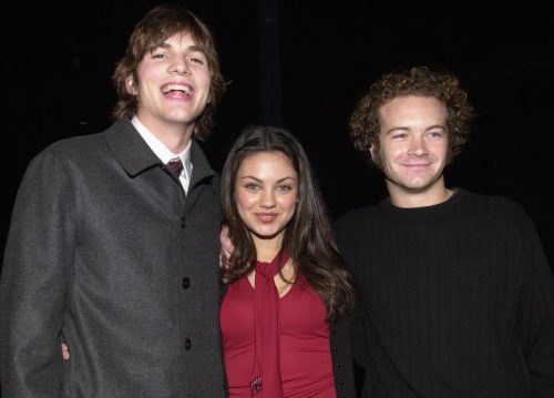 Ashton Kutcher, Mila Kunis, and Danny Masterson at the premiere of "Traffic" in 2000