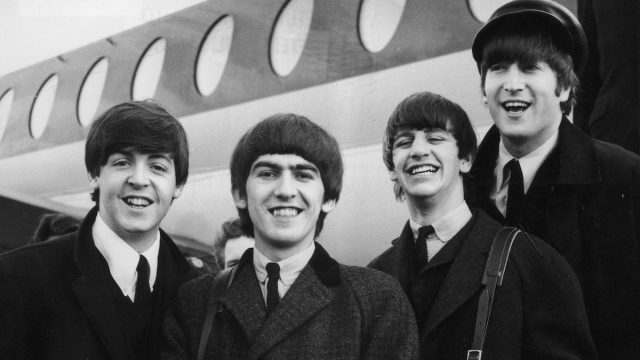 The Beatles arriving at London Airport in 1964