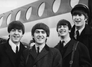 The Beatles arriving at London Airport in 1964