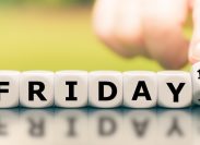 Hand turns a dice and changes the expression "friday 12th" to "friday 13th".
