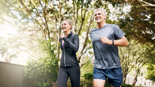 Shot of a mature couple out jogging on a sunny day
