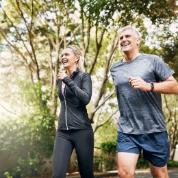 Shot of a mature couple out jogging on a sunny day