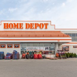 Sign on the building of Home Depot. The Home Depot, Inc. is an American home improvement supplies retailing company that sells tools, construction products,