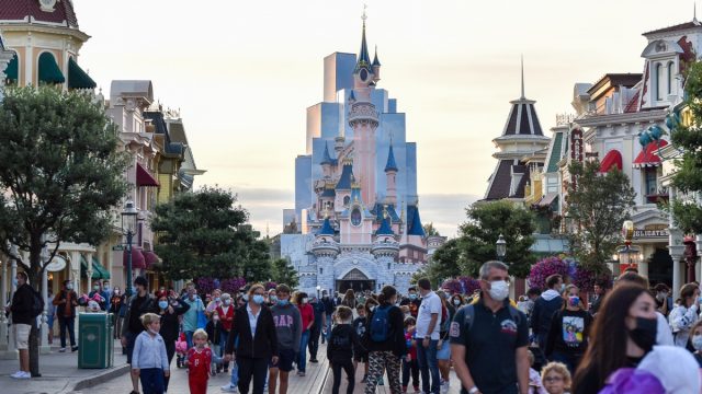 A large number of masked tourists managing to enjoy Disneyland Paris despite Covid-19 restrictions