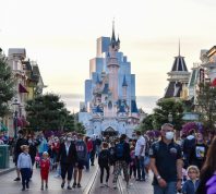 A large number of masked tourists managing to enjoy Disneyland Paris despite Covid-19 restrictions