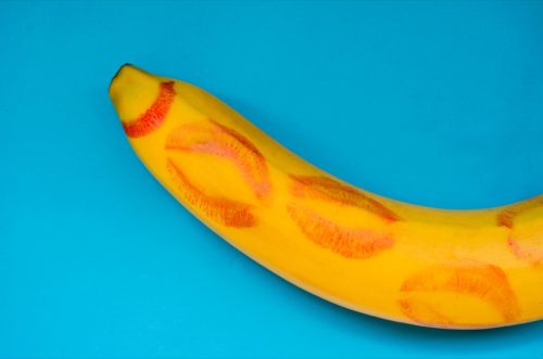 banana covered in red lipstick