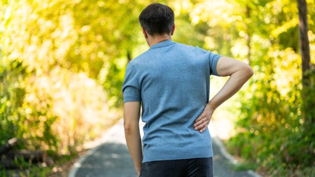 Back pain when walking outdoors