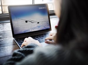 woman booking flight online